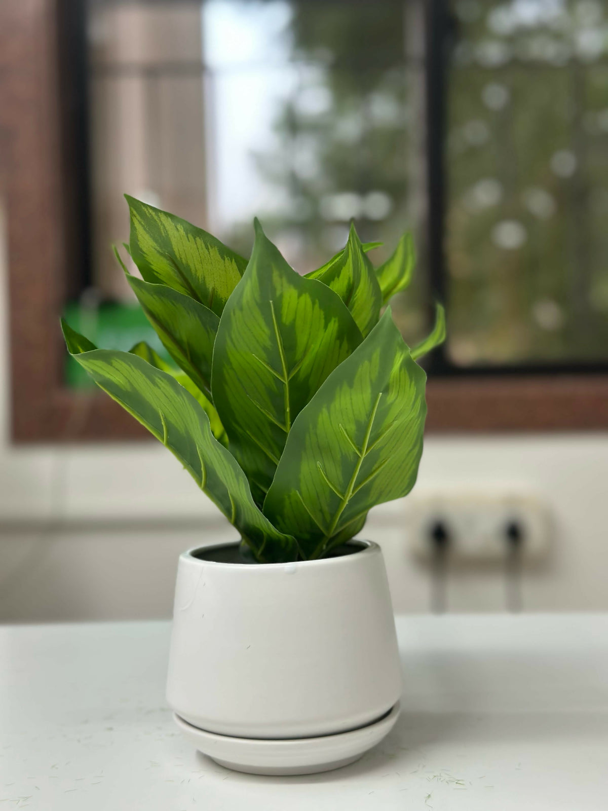 Verdant Glow Faux Plant in White Ceramic Planter